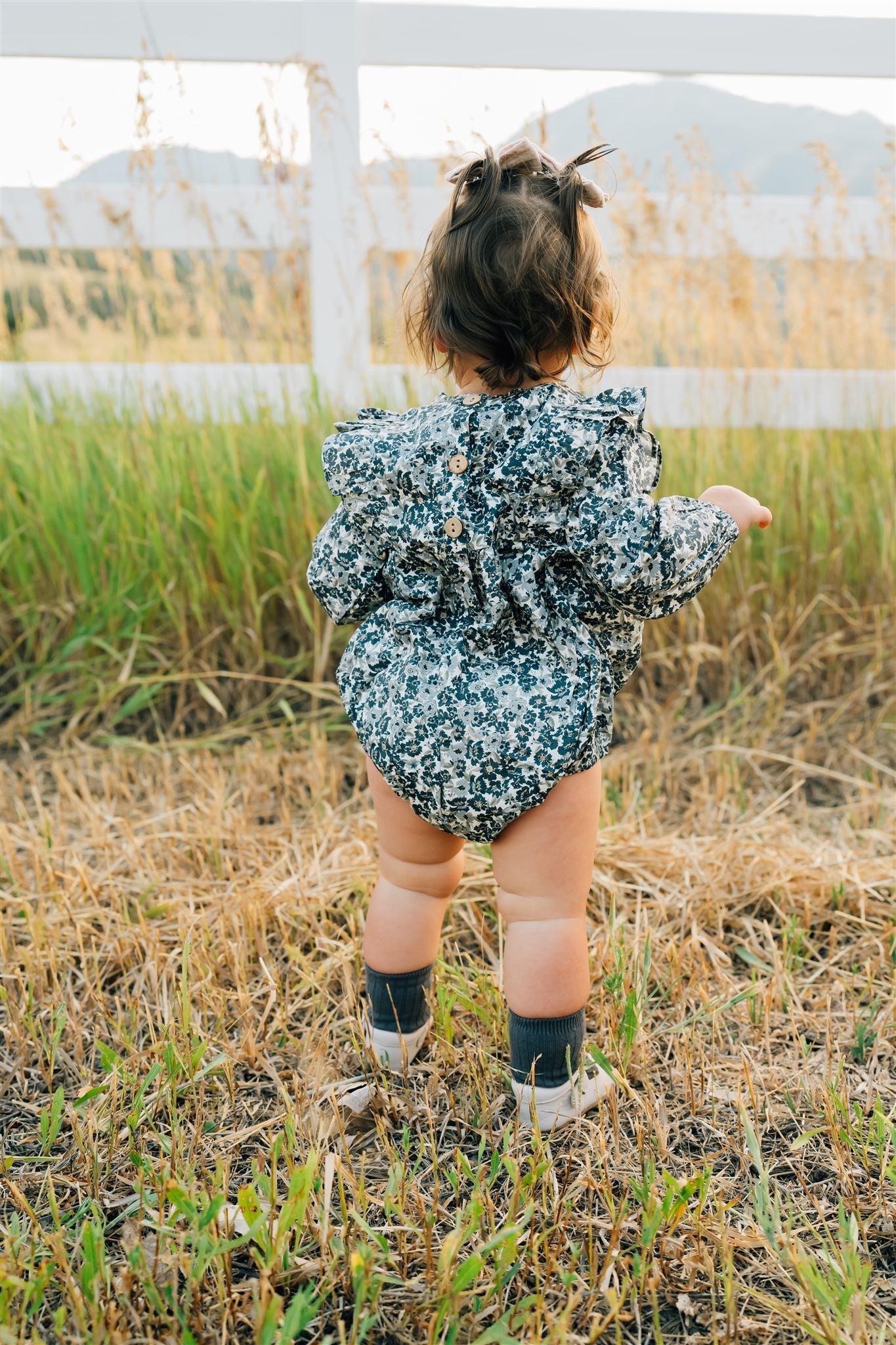 The Oaklee Floral Long Sleeve Ruffle Bubble Romper